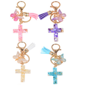 Wholesale New butterfly fringe crystal drop glue stone cross keychain Christian cute resin keychain