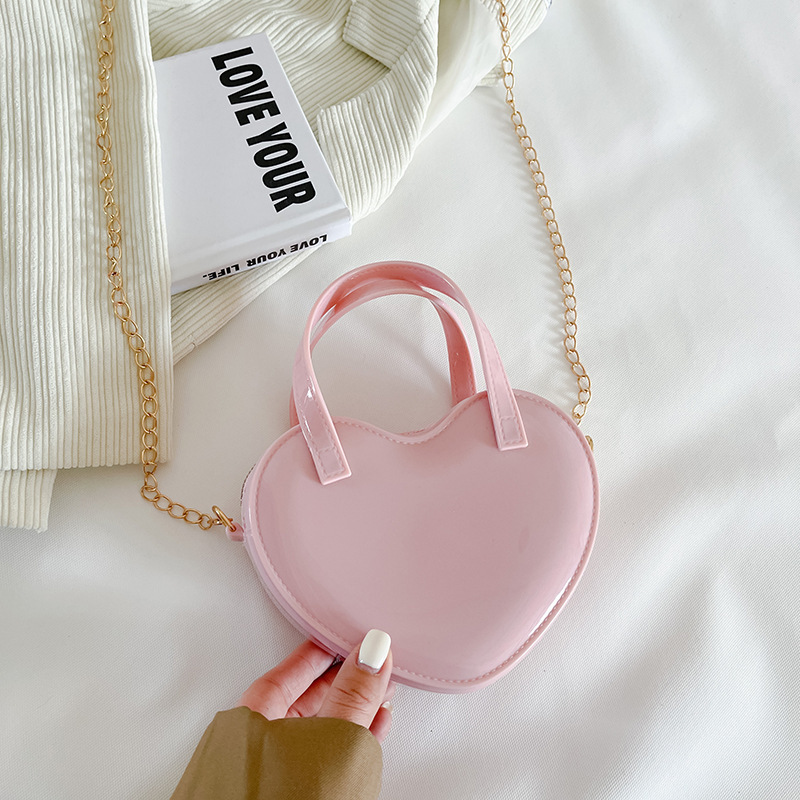 Hot Selling candy color pvc bag fashion design heart shape jelly bag small handbags ladies chain sling silicone bags for women