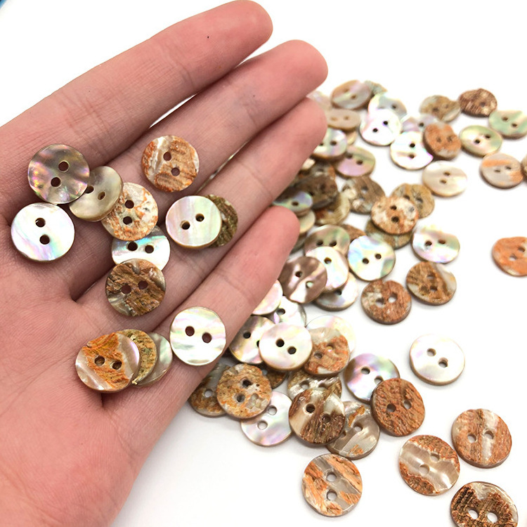 yiwu wintop bulk stock good quality 2 hole round real natural paua abalone shell button for shirt dress