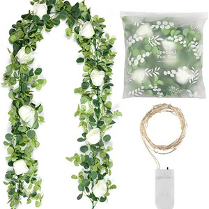 Wholesale Artificial Eucalyptus Garland Faux Greenery Garland Vines with 8 White Roses Hanging Wreath Plant with Fairy Light