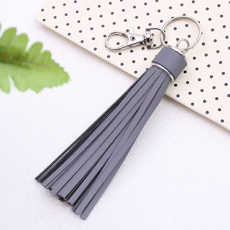 Factory main product pu luminous reflective leather keychain tassel fashion personality keychain