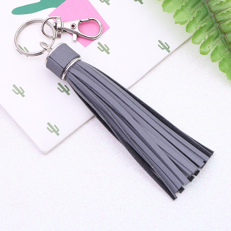 Factory main product pu luminous reflective leather keychain tassel fashion personality keychain