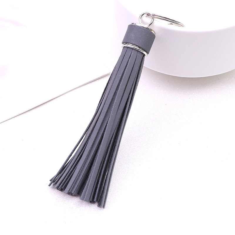 Factory main product pu luminous reflective leather keychain tassel fashion personality keychain