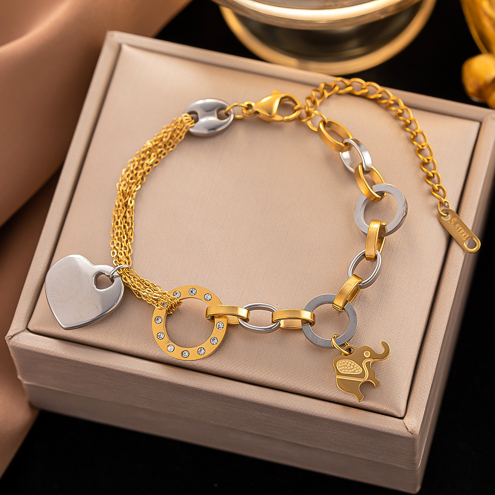 Wholesale New Arrival Simple Design 316L Stainless Steel 18k Gold Plated Hollow Heart Elephant Women Bangle Bracelet For Women