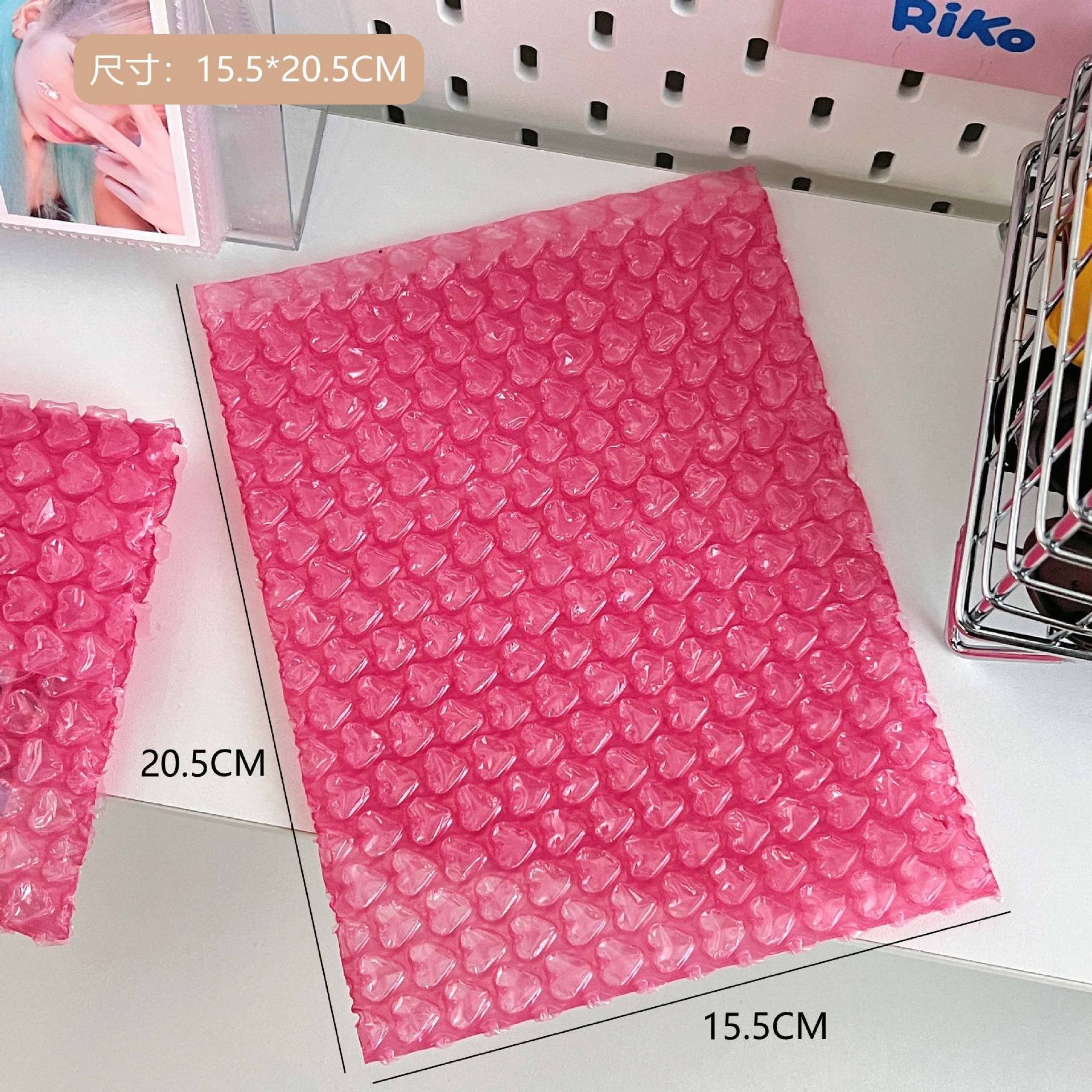 Customized Eco Friendly Poly Protective Film New Cushion Roll Shipping Packaging Love Shaped Pink Heart Bubble Cushion Wrap