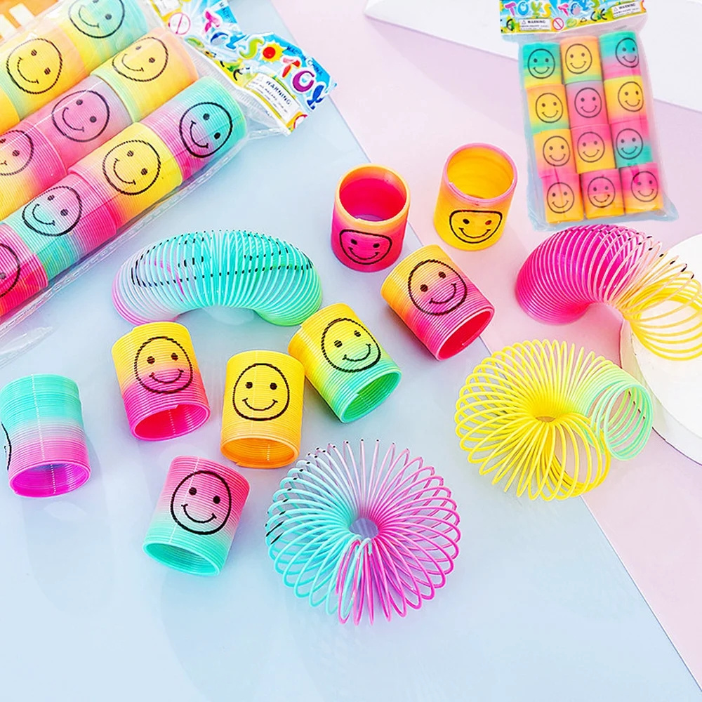 12Pcs Rainbow Smile Magic Springs Circle Toys for Children Birthday Party Favors Giveaway Gifts