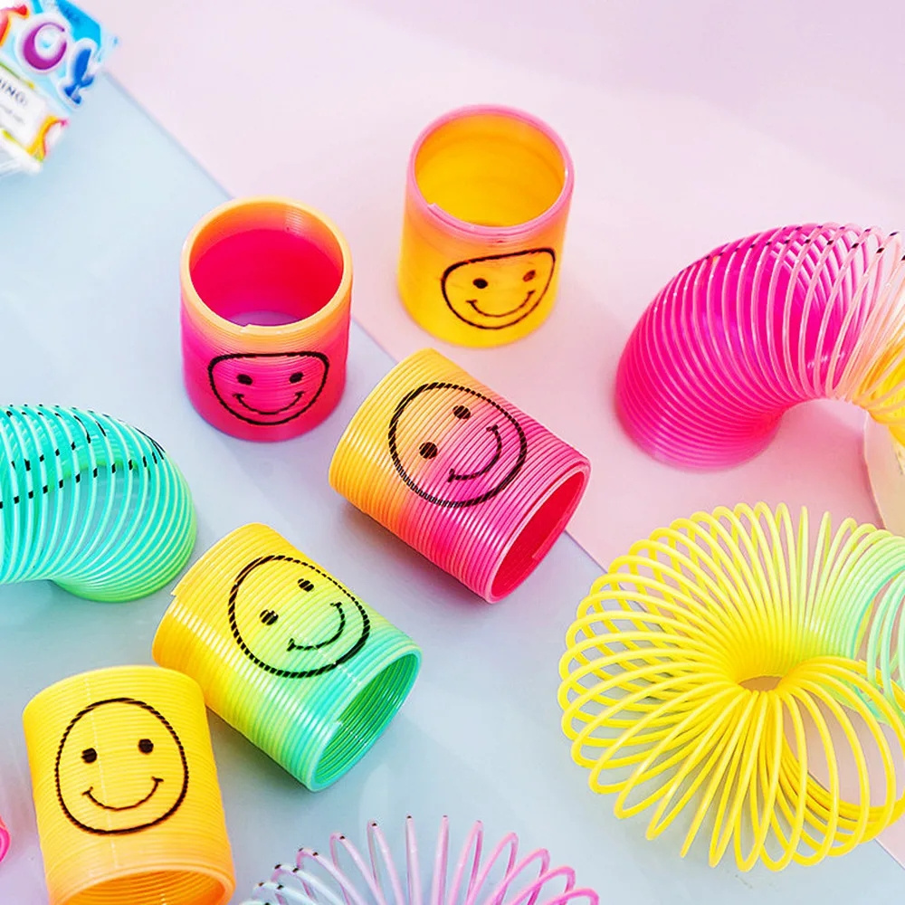 12Pcs Rainbow Smile Magic Springs Circle Toys for Children Birthday Party Favors Giveaway Gifts