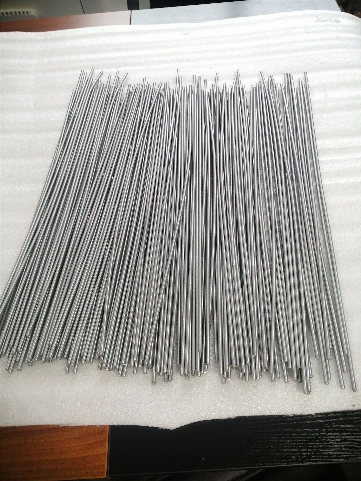 Nitinol bar shape memory alloy bar rod superelastic price per kg nickel titanium alloy round bar and rod