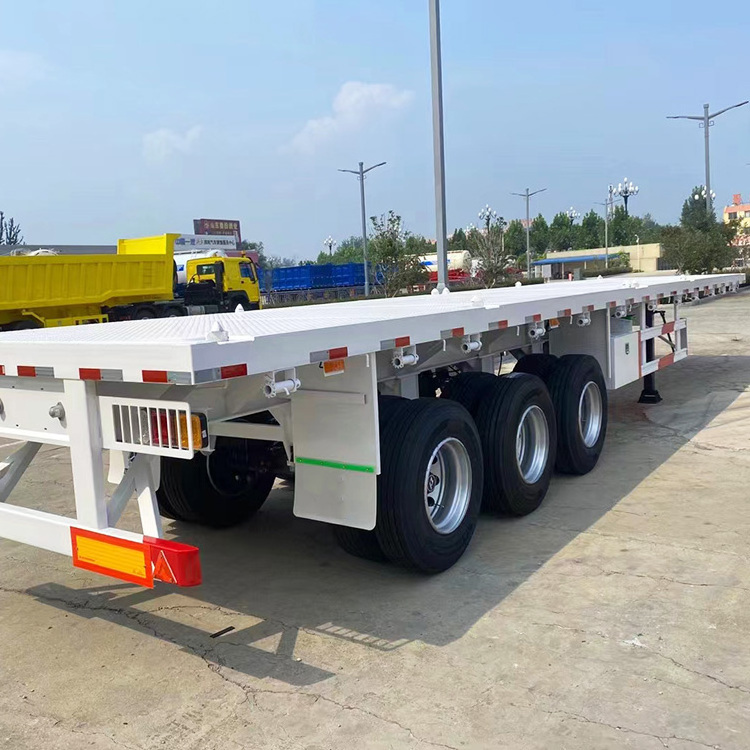 China Factory 3axles Flatbed 20ft 40ft Container Trailer Mechanical Suspension Flat Bed Semi Trailer Export To Tanzania