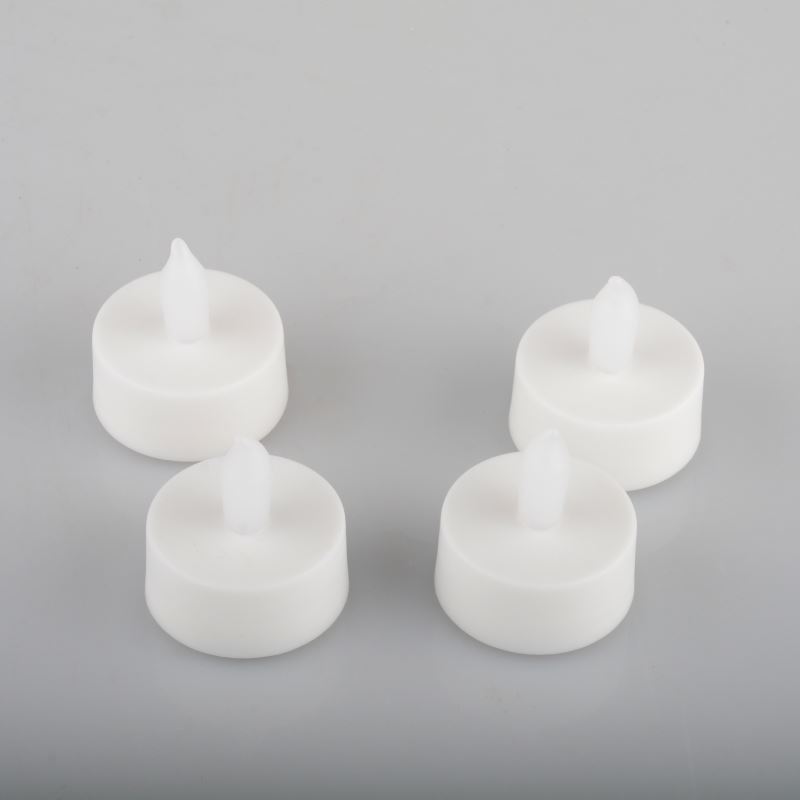 Hot Selling Bulk Button Battery Operated Electric Plastic Flameless Xmas Christmas Tealight Candles Mini Led Tea Light