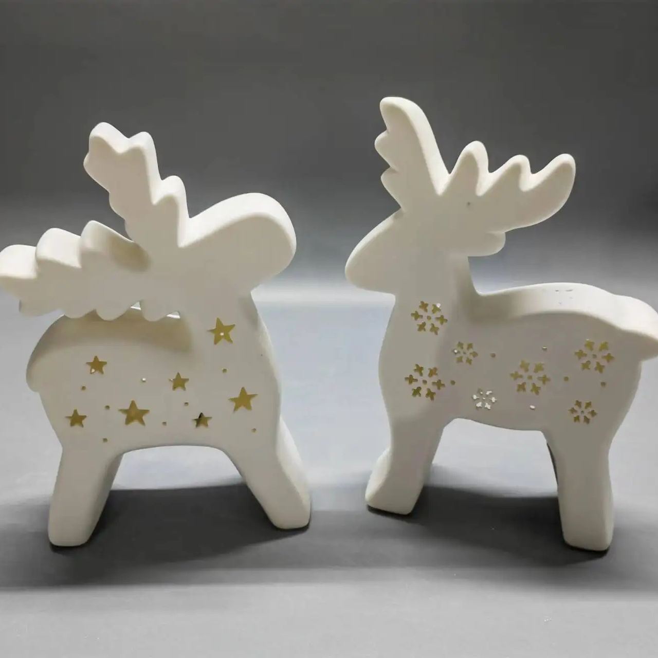 2024 New Arrival Ceramic Deer Bell With Warm Tea Lights Hollow Out Christmas Tree Decoration Simple Luxury Home Glowing Hanging