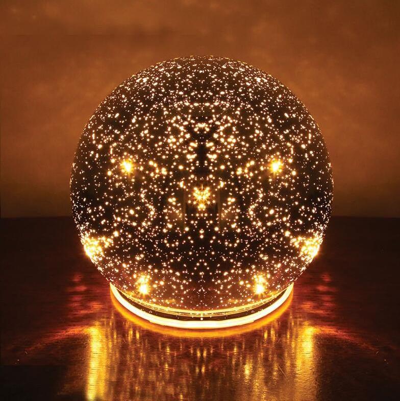 Lighted Mercury Glass Christmas ball mirror surface reflects tiny pinpoints of light like a starry sky decoration