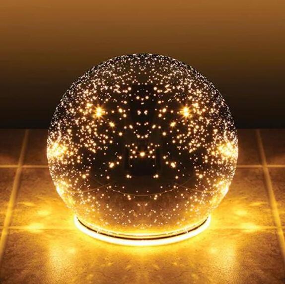 Lighted Mercury Glass Christmas ball mirror surface reflects tiny pinpoints of light like a starry sky decoration