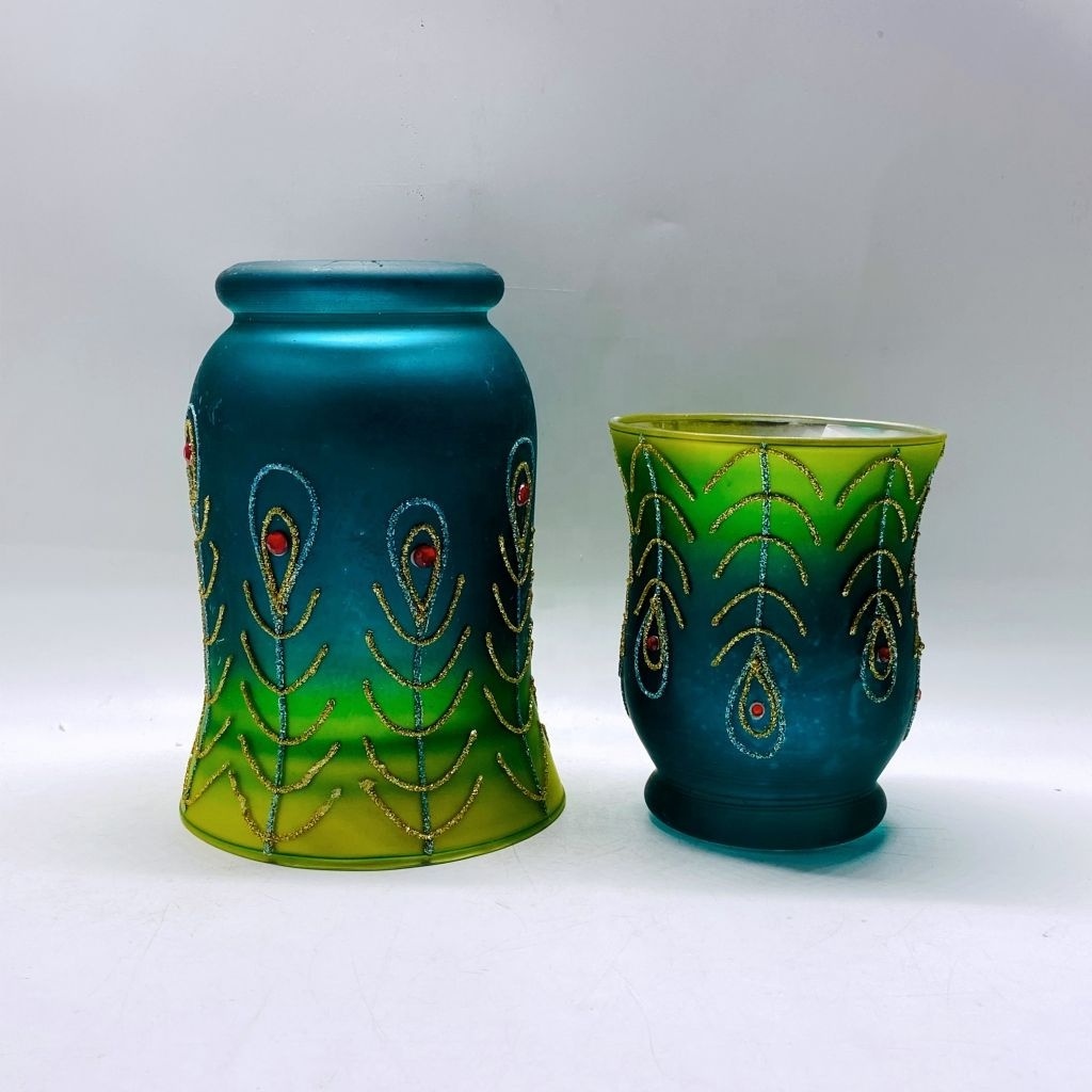 New arrival  glass tea light holder  with peacock tail design pattern on glass jar