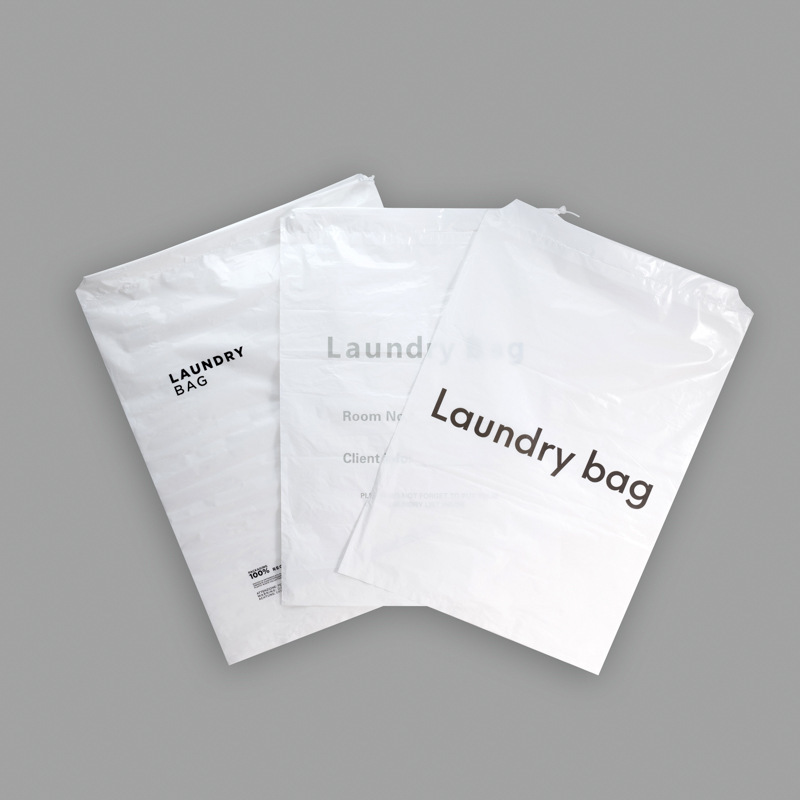 Hotel Disposable Travel Laundry Bag  Plastic Hotel Drawstring Bag with Logo