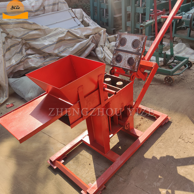 Manual brick machine small clay interblocking brick making machine price in india domestos block