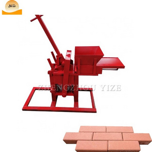 Manual brick machine small clay interblocking brick making machine price in india domestos block