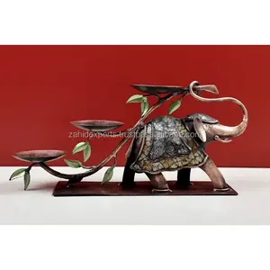 Elephant candle holder bird and animals decorative aluminium metal candle stand latest design high on brass plated Zahid Exports