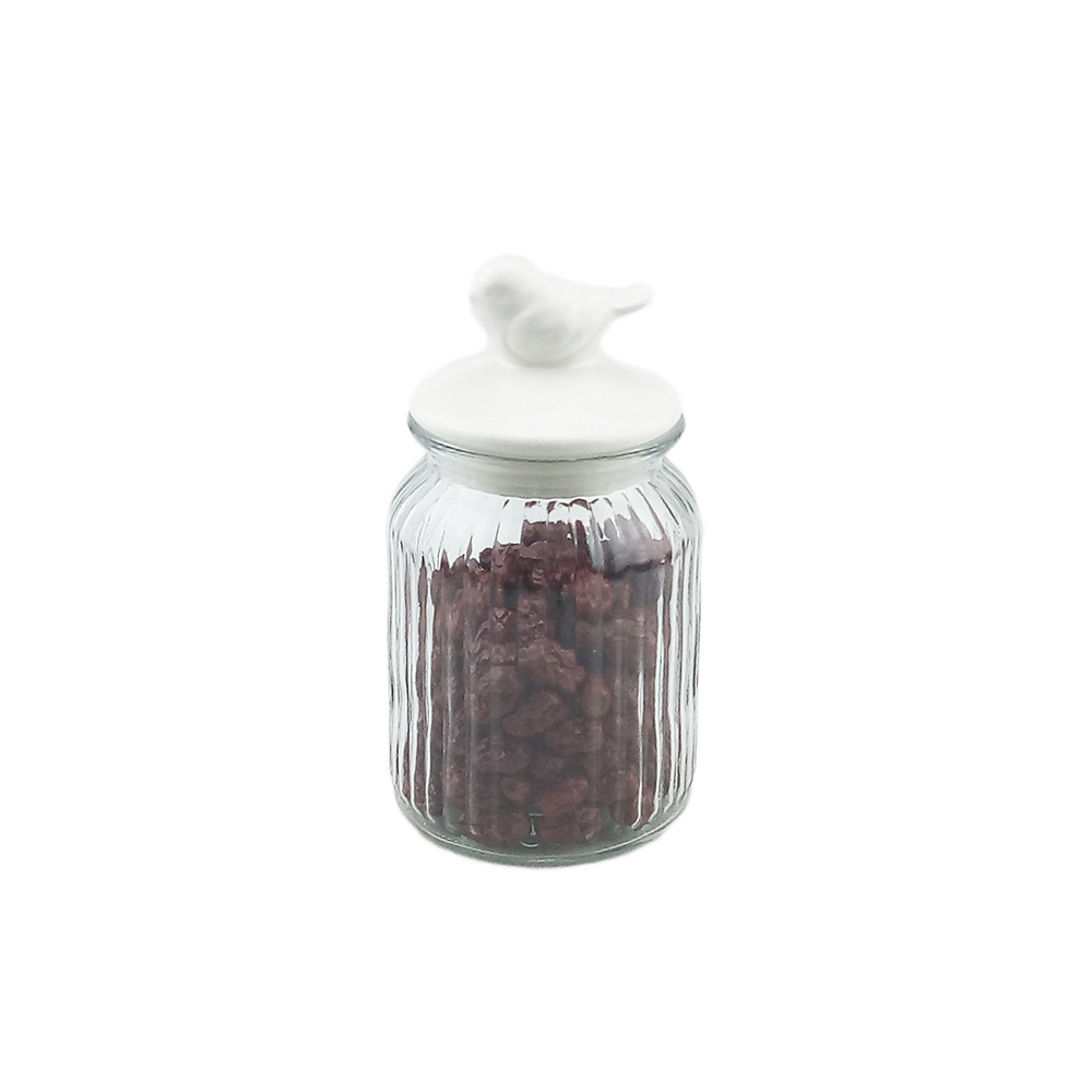 Clear glass storage jars with ceramic lids for food storage