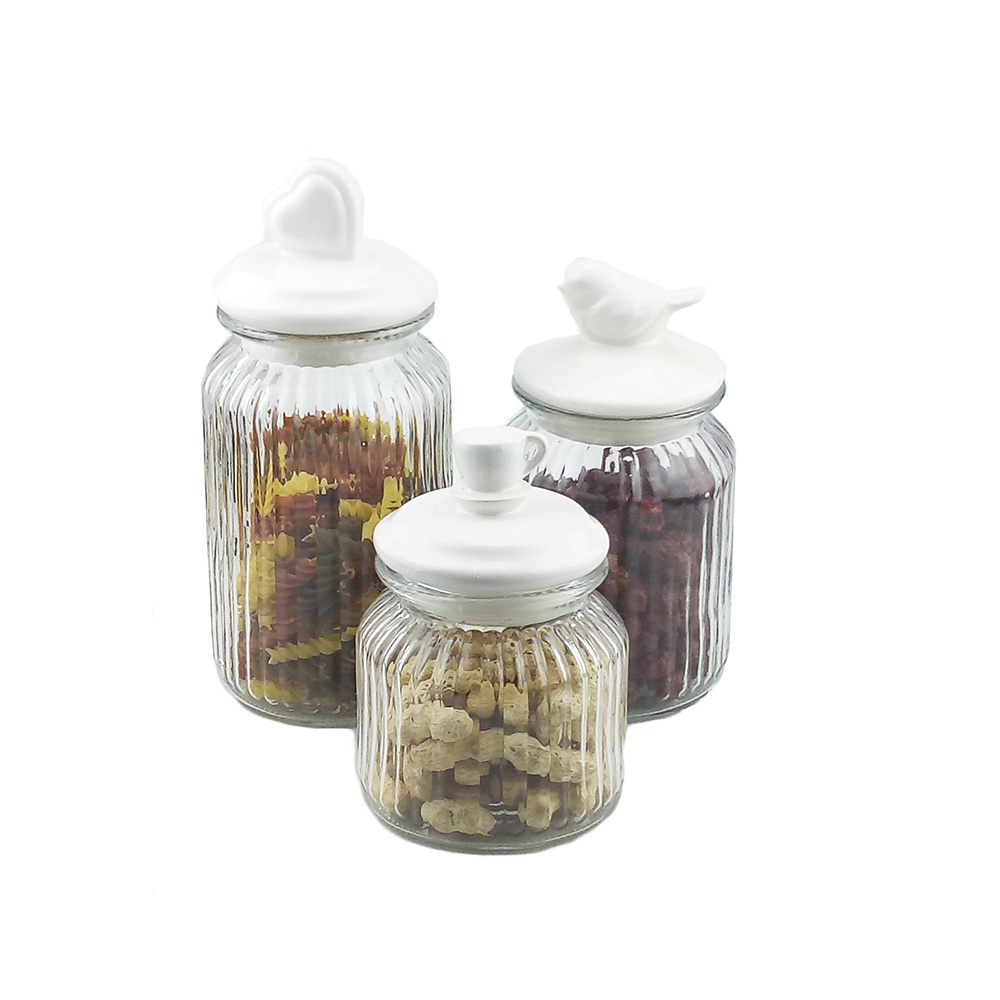 Clear glass storage jars with ceramic lids for food storage