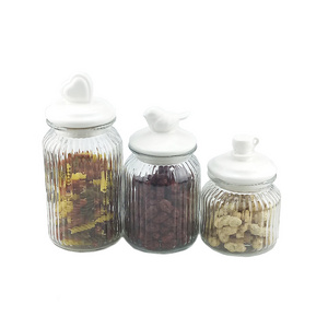 Clear glass storage jars with ceramic lids for food storage