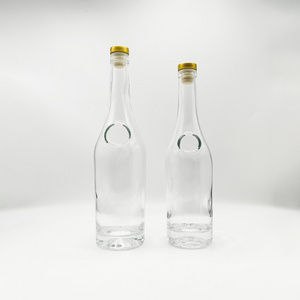 Glass bottle supplier 500 ml 750 ml liquor bottle circular shape glass bottle with cork for liquor