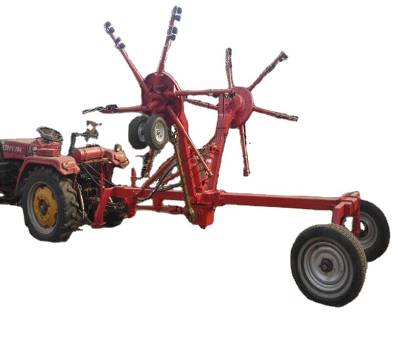 Tractor mounted pto drive double rotary hay rake