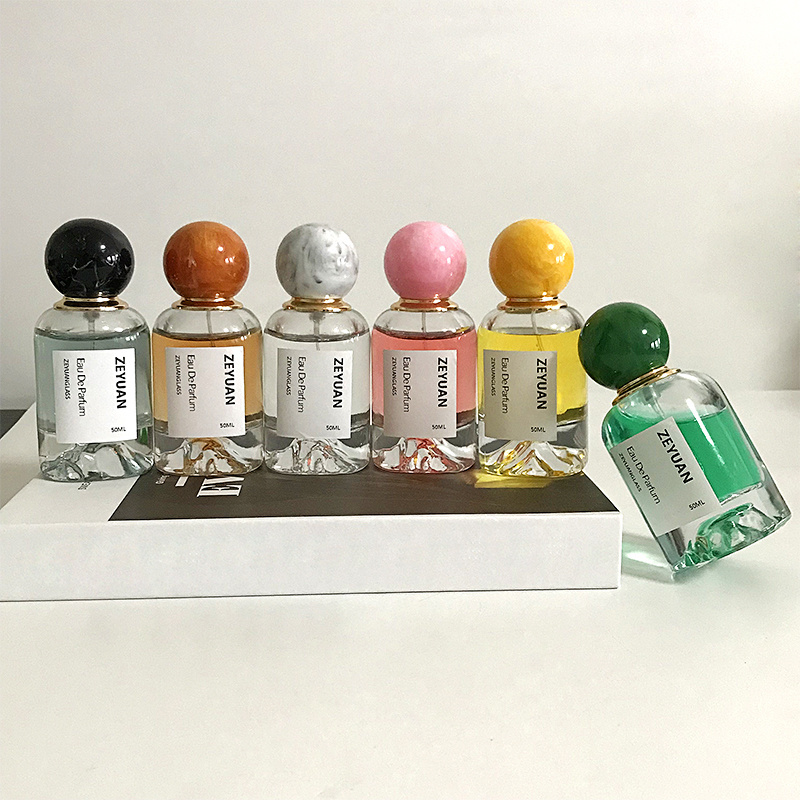 50ml  perfume bottle Luxury Dubai round clear snow mountain bottom crimp spray glass bottle with colorful resin ball lid