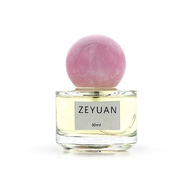 Low MOQ 30ml Perfume Glass Bottle With Pink Ball Shape Resin Cap Small Round Perfume Bottle