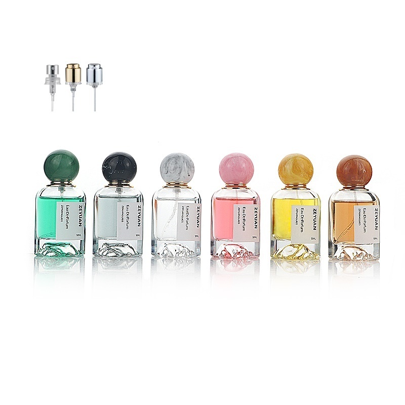 50ml  perfume bottle Luxury Dubai round clear snow mountain bottom crimp spray glass bottle with colorful resin ball lid