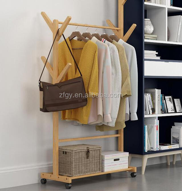 Freestanding wooden clothing store display rack with wheels