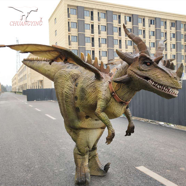 Sellto japanese life size halloween professional realistic vivid animatronic big dinosaurio ride on dinosaur adult movie costume