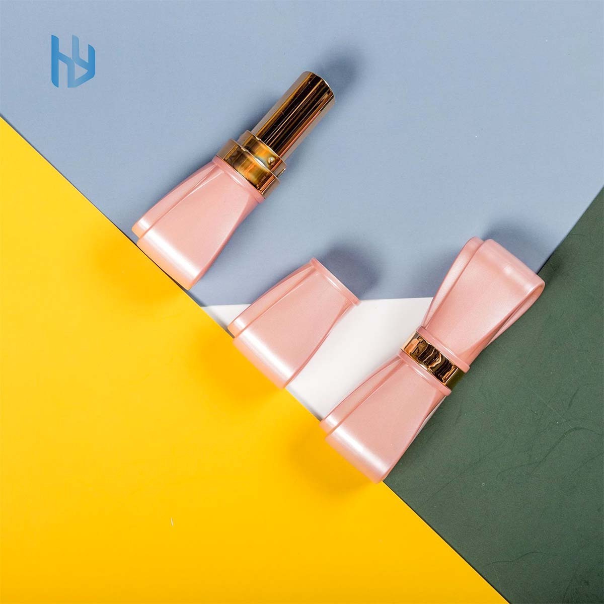 Wholesale private label lipstick tube 3.5g pink bow shape empty printing lipstick tube for cosmetic packaging