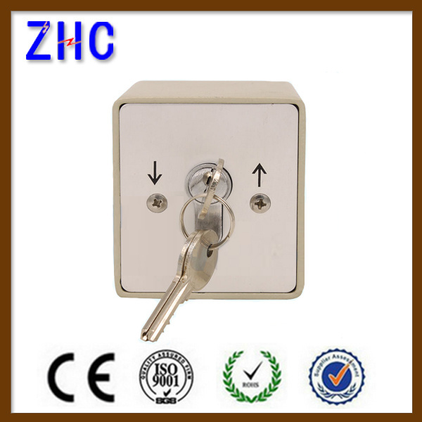 Safety key interlock switch for roller shutter door