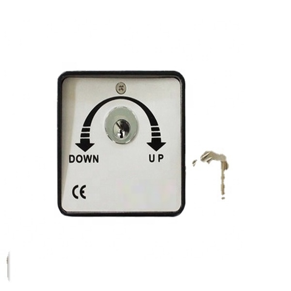 Safety key interlock switch for roller shutter door