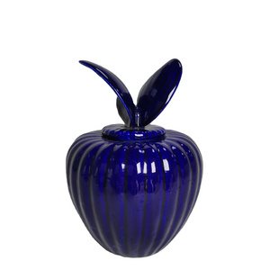 Ceramic pet urn with textured butterfly wing lid