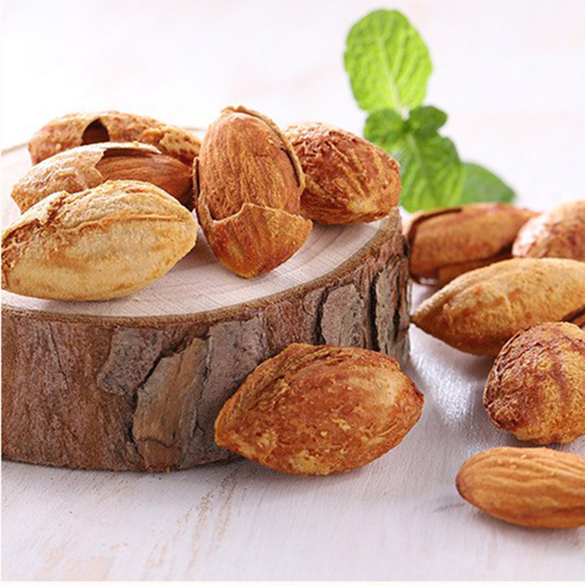 The factory directly supplies Chinese traditional nut thin shell cream and hand peeled almond renbatan wood