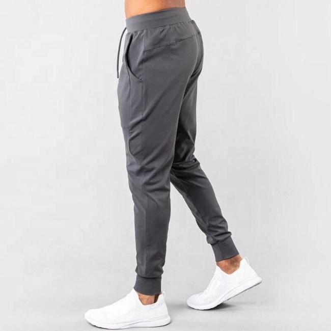 Custom Logo Polyester Spandex Men's Tapered Active Joggers 4-Way Stretch Gym Running Trousers Quick Dry Sweatpants