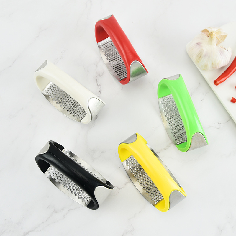 Stainless steel arc garlic press Multifunctional manual garlic masher Creative garlic twister