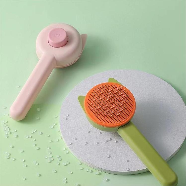 New pet comb Clean beauty cat hair removal comb press steel needle comb hair removal pet supplies