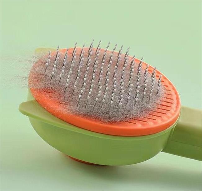 New pet comb Clean beauty cat hair removal comb press steel needle comb hair removal pet supplies