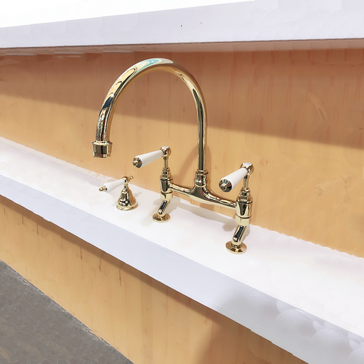 High quality bridge  brass classical gold kitchen sink faucet  deck mounted prevent ironing  two handle