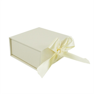 Light yellow cardboard square clamshell magnetic soap packaging handmade nude gift box with ribbon  logo for clothing