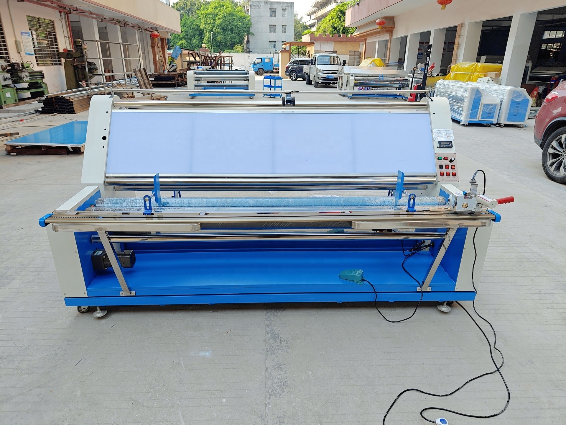 Fabric Rolling Machine with Edge Cutter