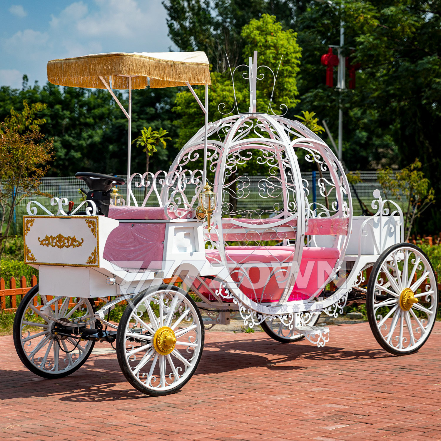 Wedding parties can ride in a white pumpkin carriage