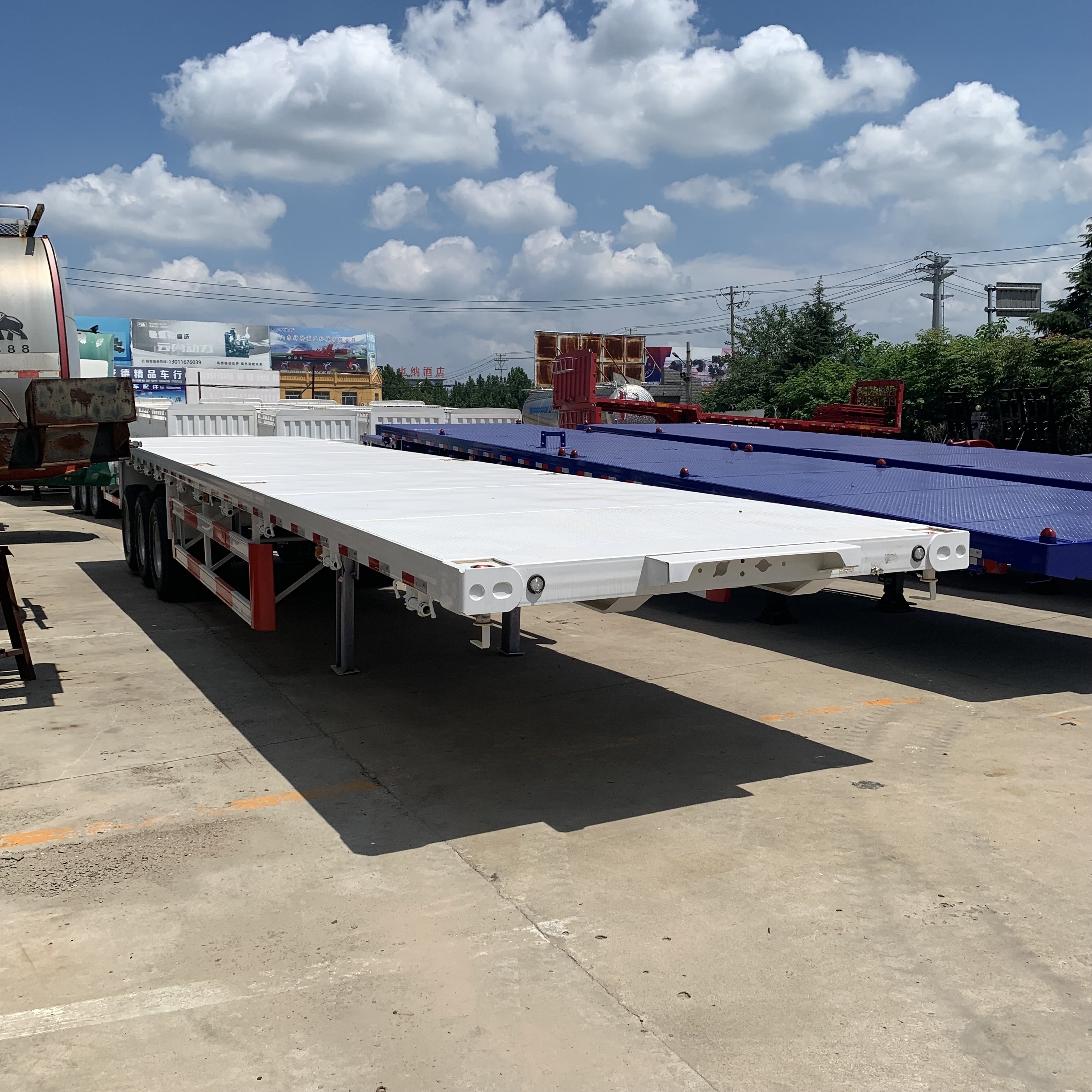 Trailer Truck 3 Axle 40ft Flatbed Container Flat bed Trailer Export to Tanzania