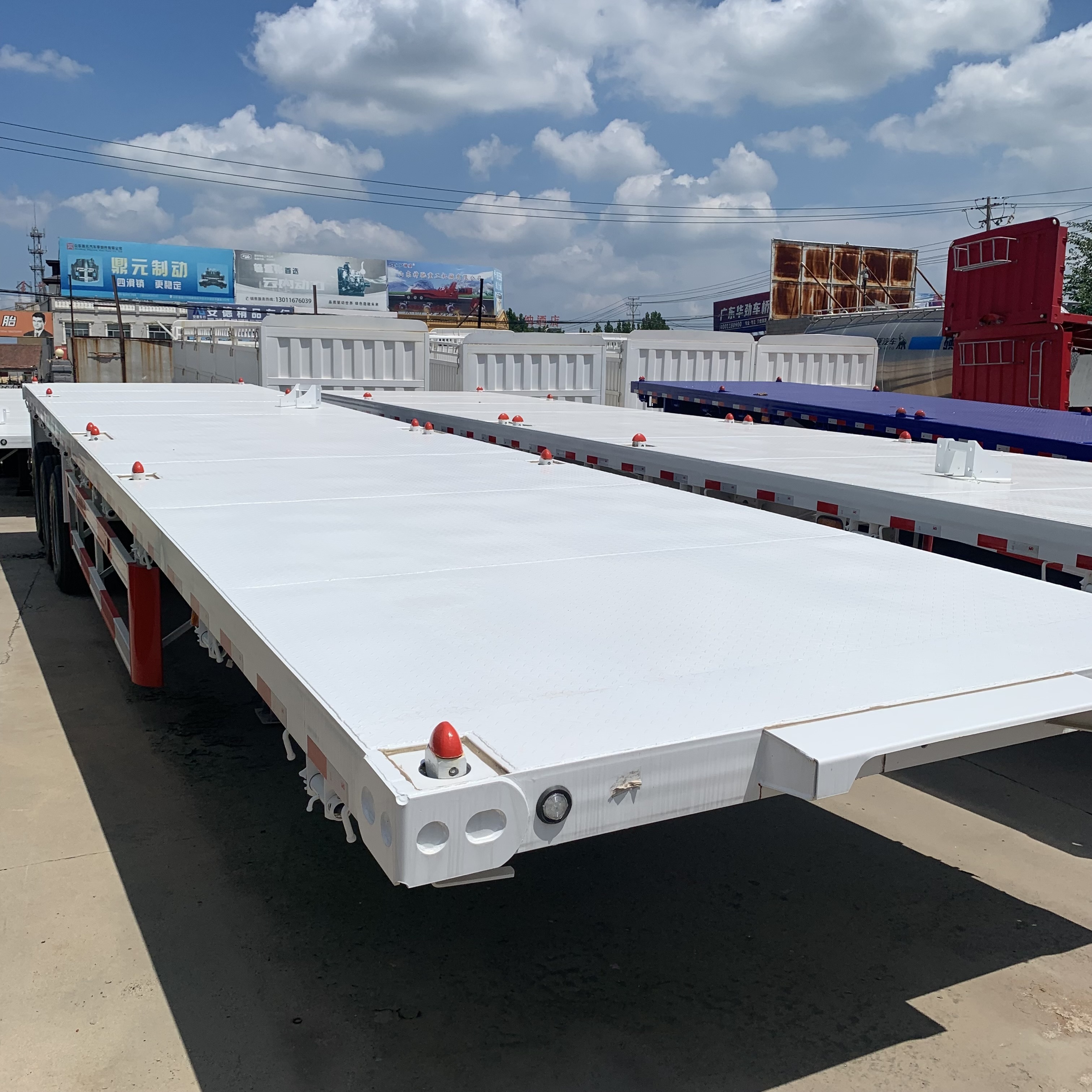 Trailer Truck 3 Axle 40ft Flatbed Container Flat bed Trailer Export to Tanzania