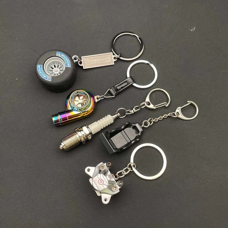 Selling high quality luxury car parts accessories seat color wheels turbo metal keychain