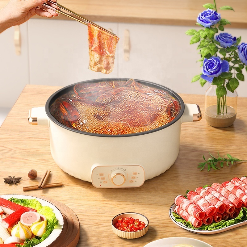 Double flavor hotpot electric cooker high end spicy hot pot cooker China professional electric hotpot skillets caldron factory