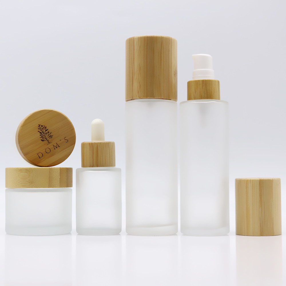 Empty bamboo cosmetic packaging 30ml 40ml 50ml 100ml 120ml frosted lotion pump glass spray dropper bottle with wood bamboo lid